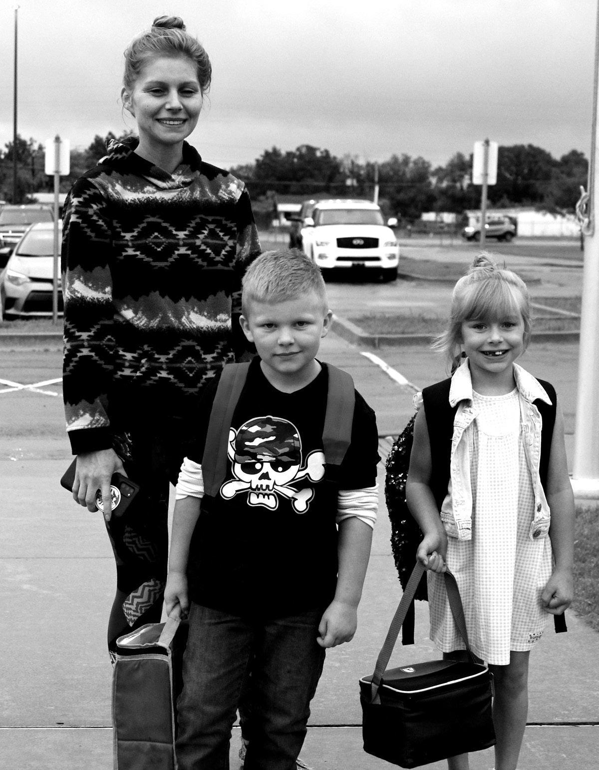 Mareena Robinson escorted her children